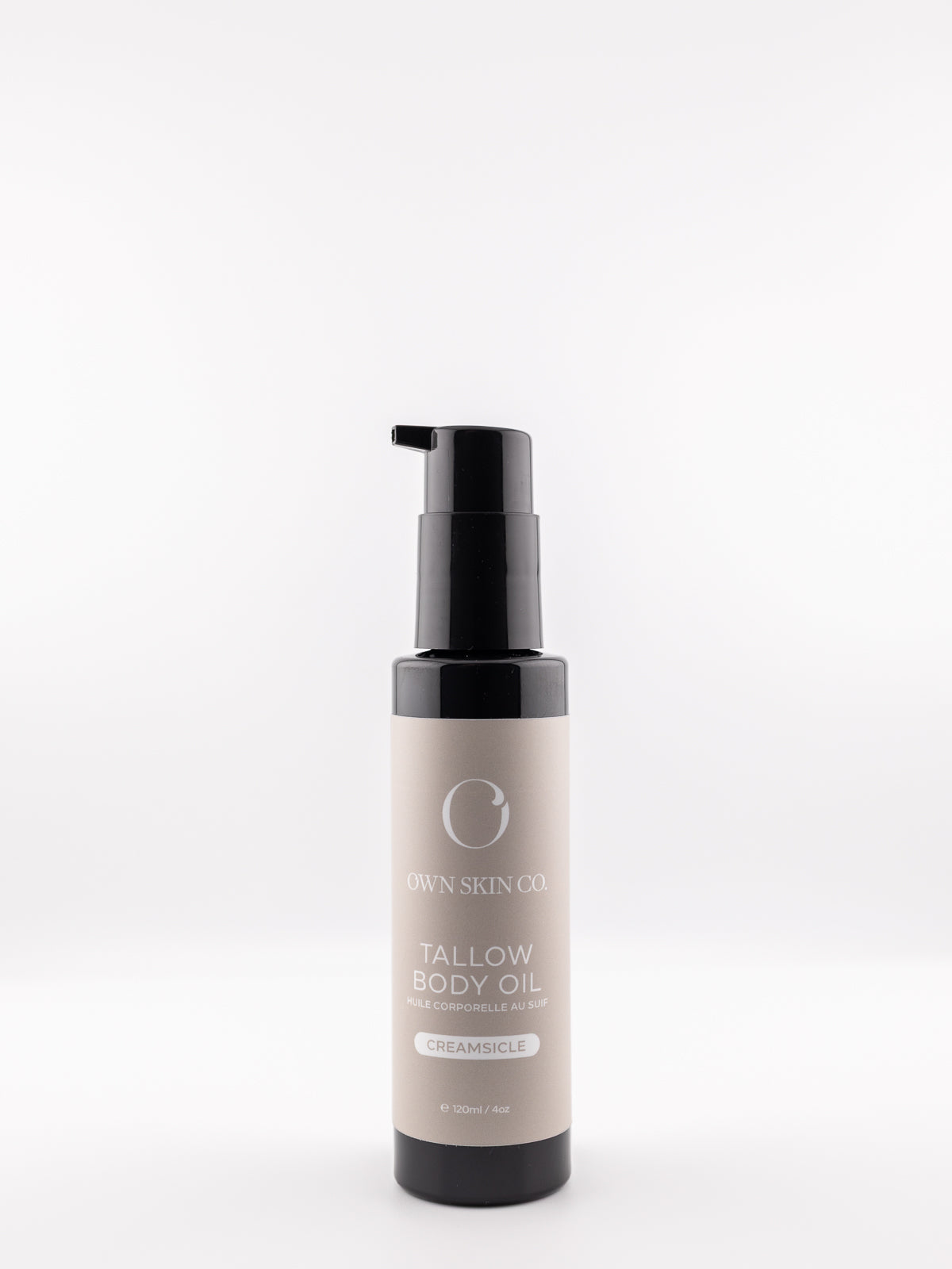 Tallow body oil citrus vanilla creamsicle bottle with pump on a white background. Made in Canada body serum with beeswax