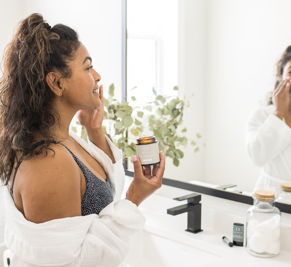 Woman applying Beef Tallow as Skincare