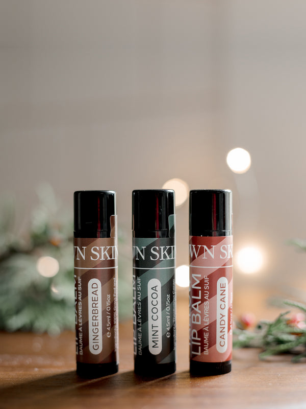 Three Limited Edition Christmas Beef Tallow Lip Balms in Mint Cocoa, Candy Cane and Gingerbread With Christmas twinkle