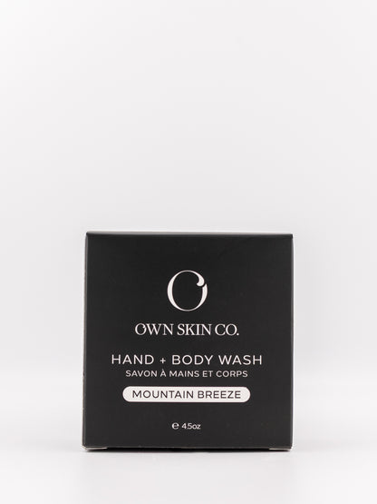 Own Skin Co. Mountain Breeze Hand & Body Wash in a square black box with white text, photographed on a clean white background.