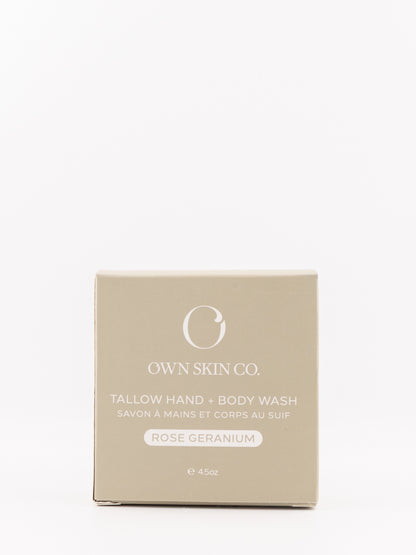 OWN SKIN CO. Tallow Hand & Body Wash in Rose Geranium scent, shown in its beige cardboard packaging box against a clean white background.