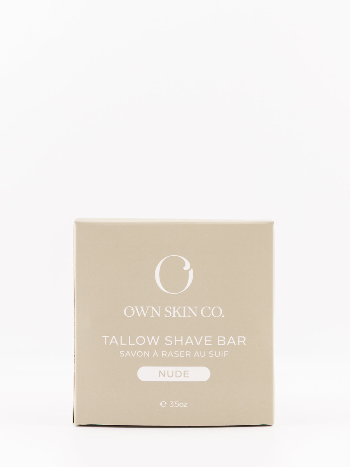 Own Skin Co. Tallow Shave Bar in a square beige box with white text, labeled 'NUDE' on a clean white background.
