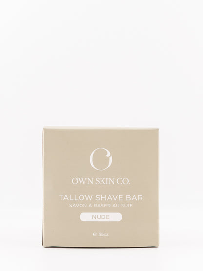 Own Skin Co. Tallow Shave Bar in a square beige box with white text, labeled 'NUDE' on a clean white background.