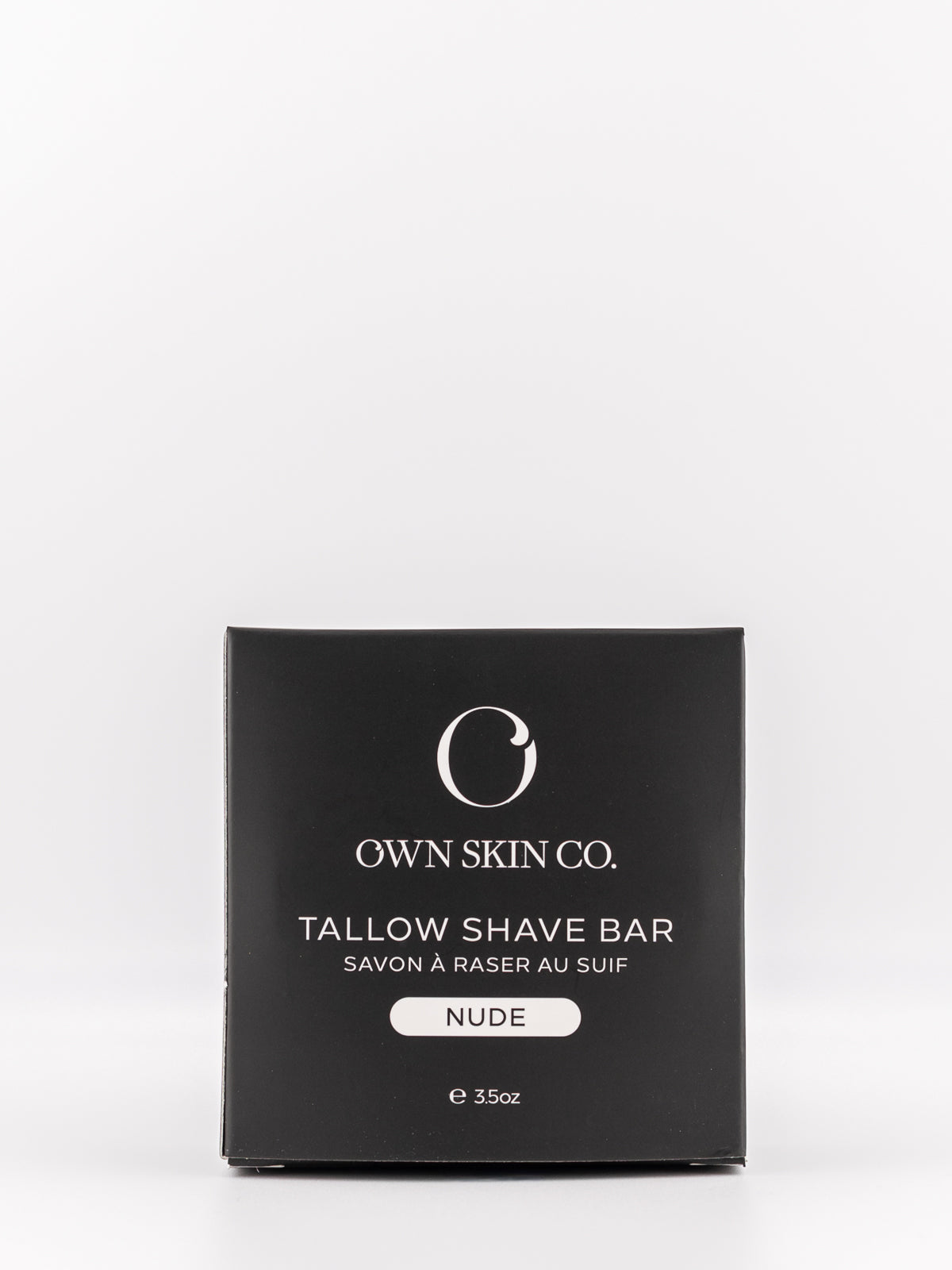 Own Skin Co. Tallow Shave Bar in unscented packaging, shown as a square black box with white text on a clean white background.